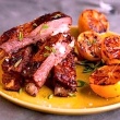 Smoked Lamb Ribs On the Grill with Lemon, Oregano and Honey