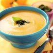 Taxicab Yellow Tomato Soup with Fresh Basil Pesto